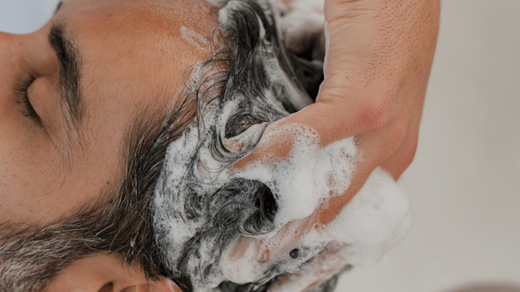 Man getting hair Washed